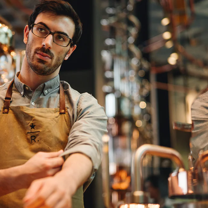 A partner adjusting their sleeve.