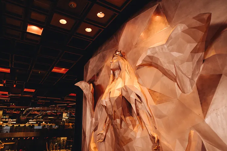 Copper sculpture of the Starbucks Siren