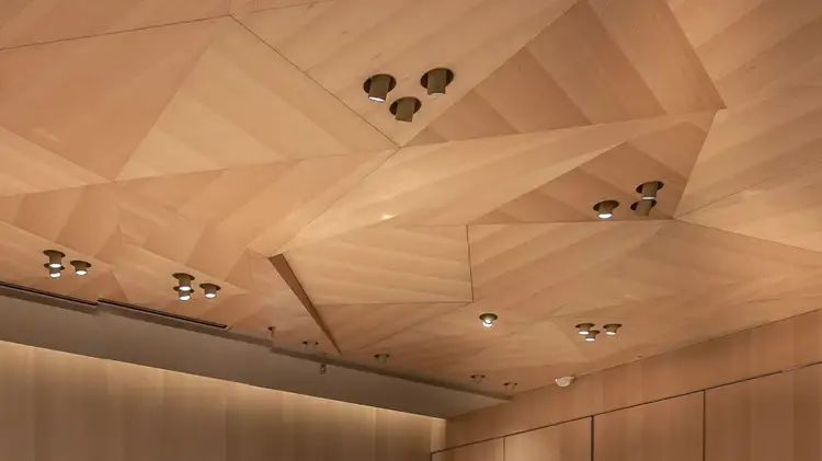 Origami-inspired ceiling featuring intricate geometric designs