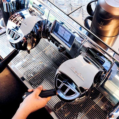 An overhead view of an espresso machine.
