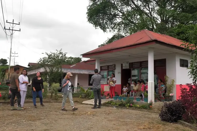 Buildings and people in a coffee growing region.